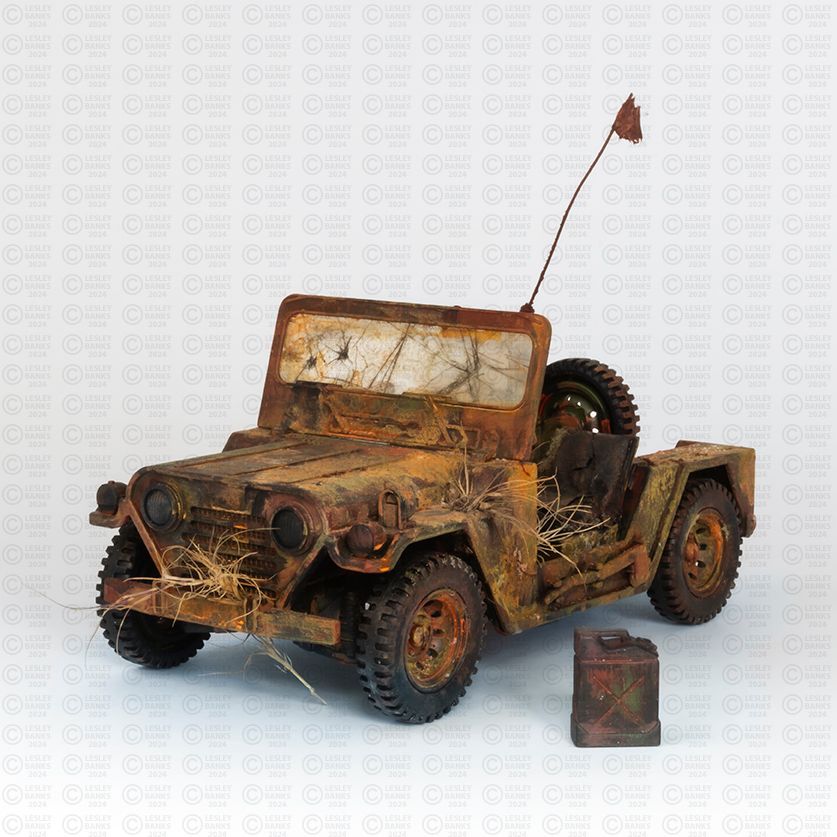 Model jeep, re-painted and textured to look abandoned.