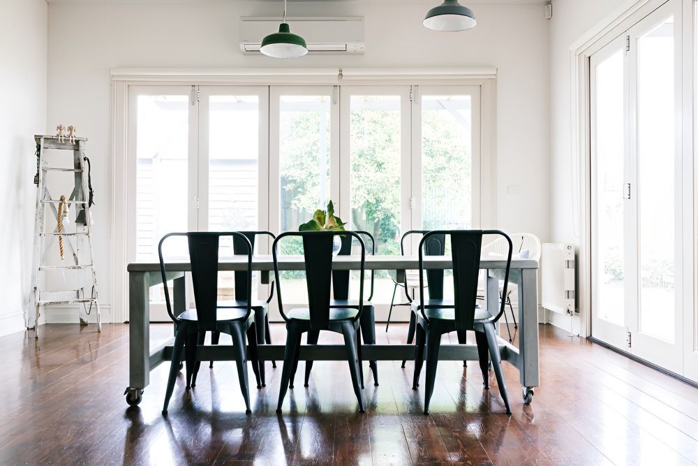A Dining Room with A Table and Chairs — Boambee Gauze 'n' Glass in Harbour, NSW