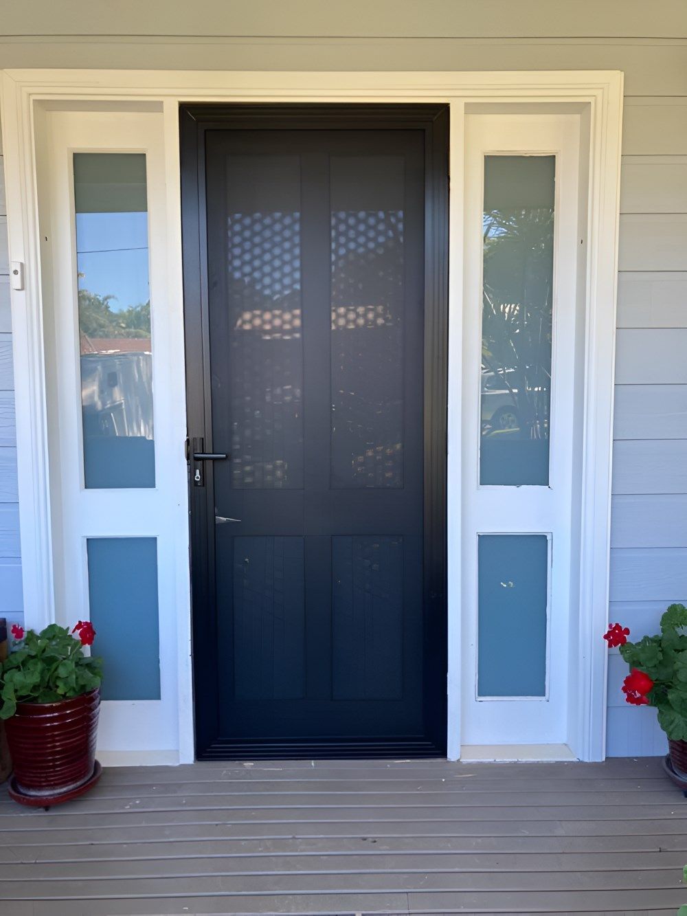 A Black Door with White Trim — Boambee Gauze 'n' Glass in Harbour, NSW