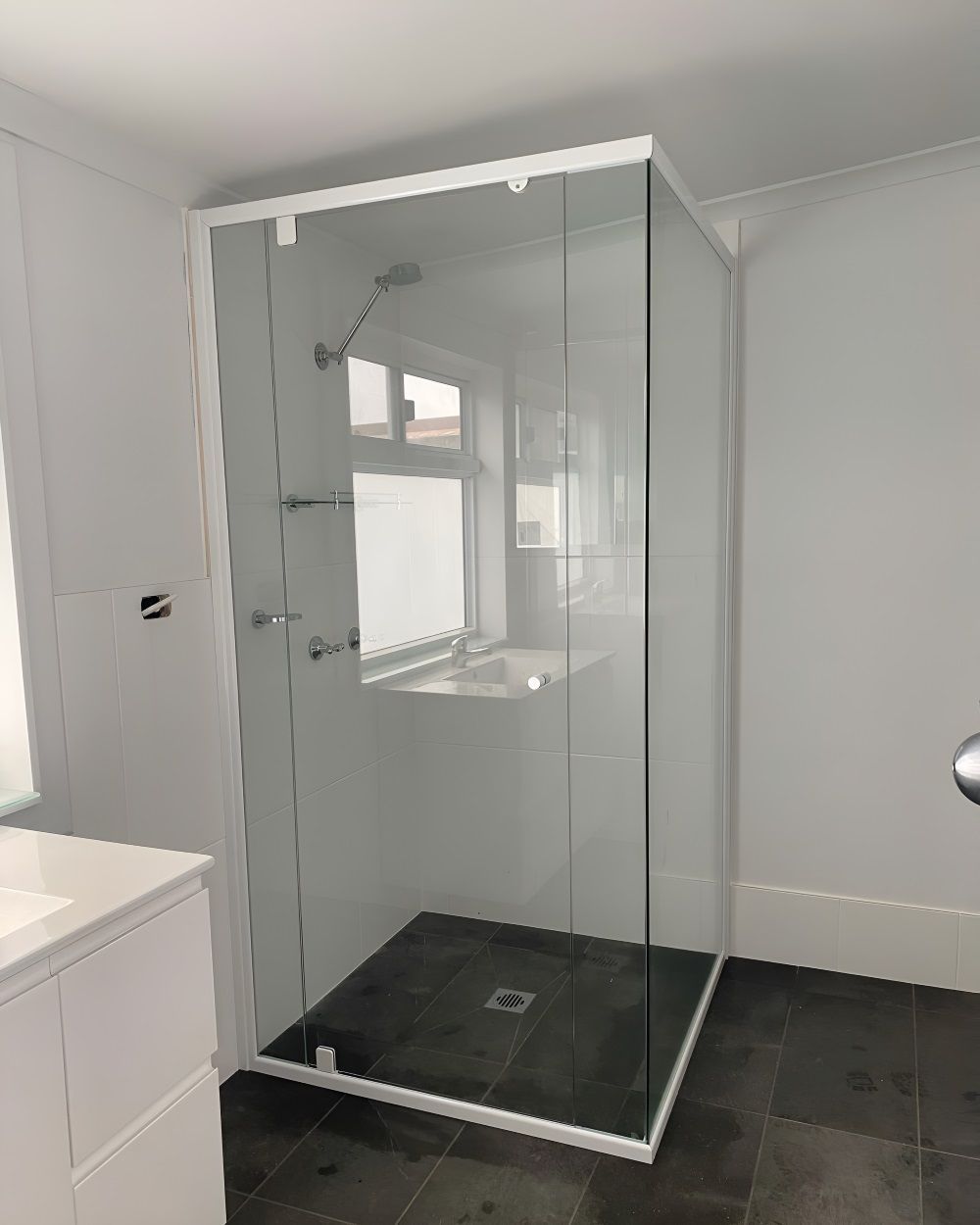 A Bathroom with A Shower Stall and A Sink — Boambee Gauze 'n' Glass in Harbour, NSW