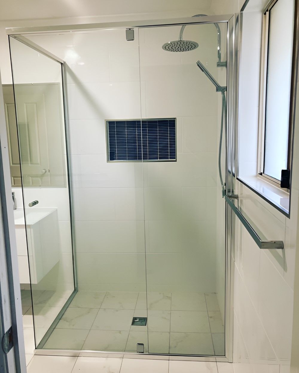 A Bathroom with A Walk in Shower and A Window — Boambee Gauze 'n' Glass in Harbour, NSW
