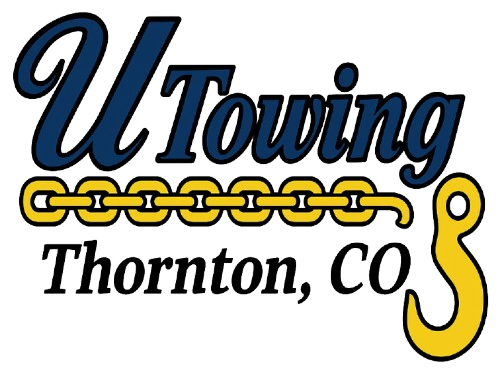 Logo for U Towing in Thornton, CO, with navy script "U Towing" over a gold chain and hook.