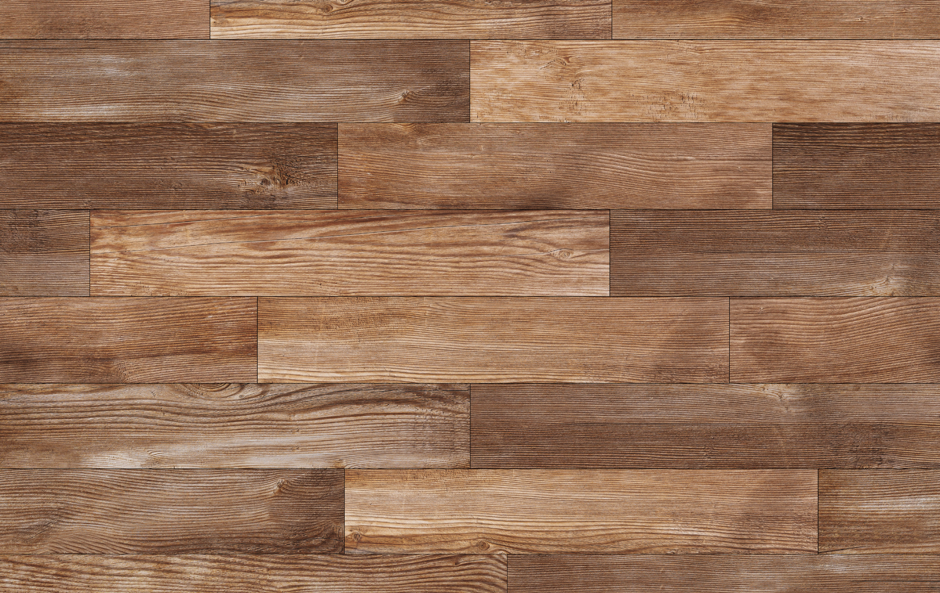 Wood planks arranged in a staggered pattern, with varying shades of brown and visible wood grain.