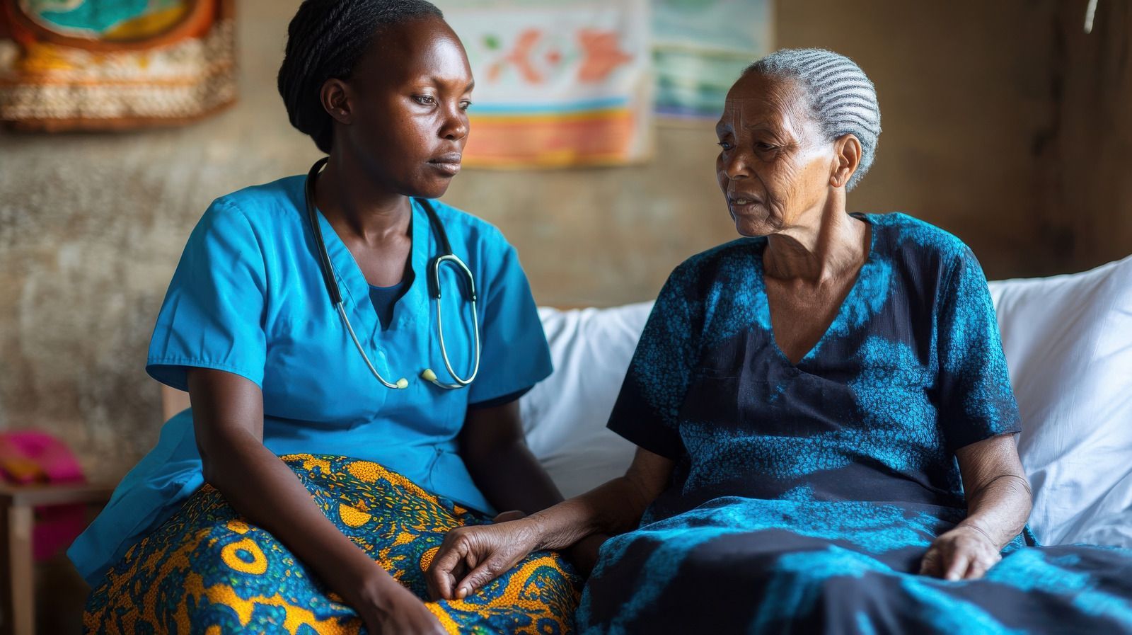 Two-story house with gray siding, garage, and driveway reflecting the sunset after rain.