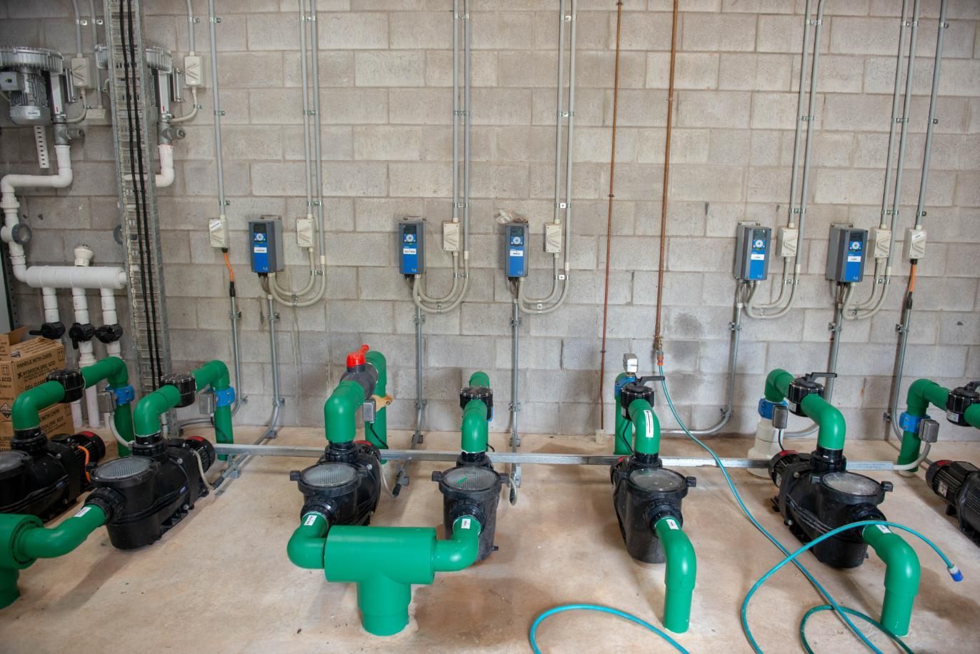 A Room Filled with Lots of Pipes and A Large Tank — Figleaf Pool Products in Coconut Grove, NT