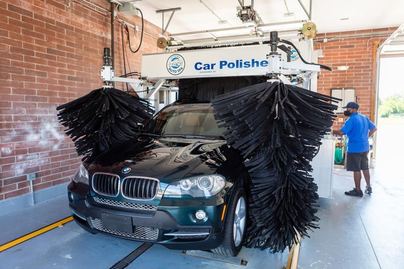 a car is being washed in a car wash .