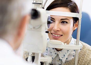 Woman look in ophthalmoscope — general in Yorktown, VA