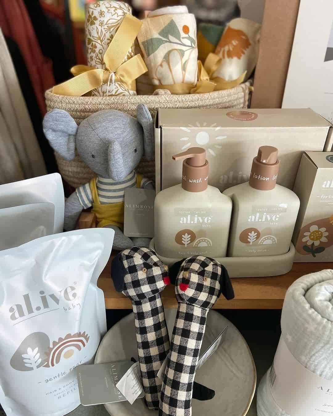 a Shelf Filled With Lots of Baby Products and Toys — Montaze In Erina, NSW