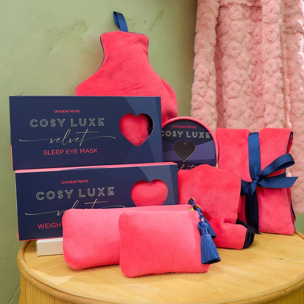 a Shelf Filled With Lots of Pillows and Blankets in a Store — Montaze In Erina, NSW