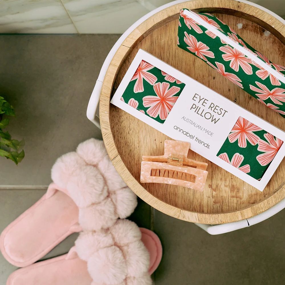 a Table With a Vase of Flowers and Candles on It — Montaze In Erina, NSW