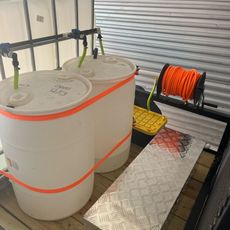 Two white barrels with the number 35 on them