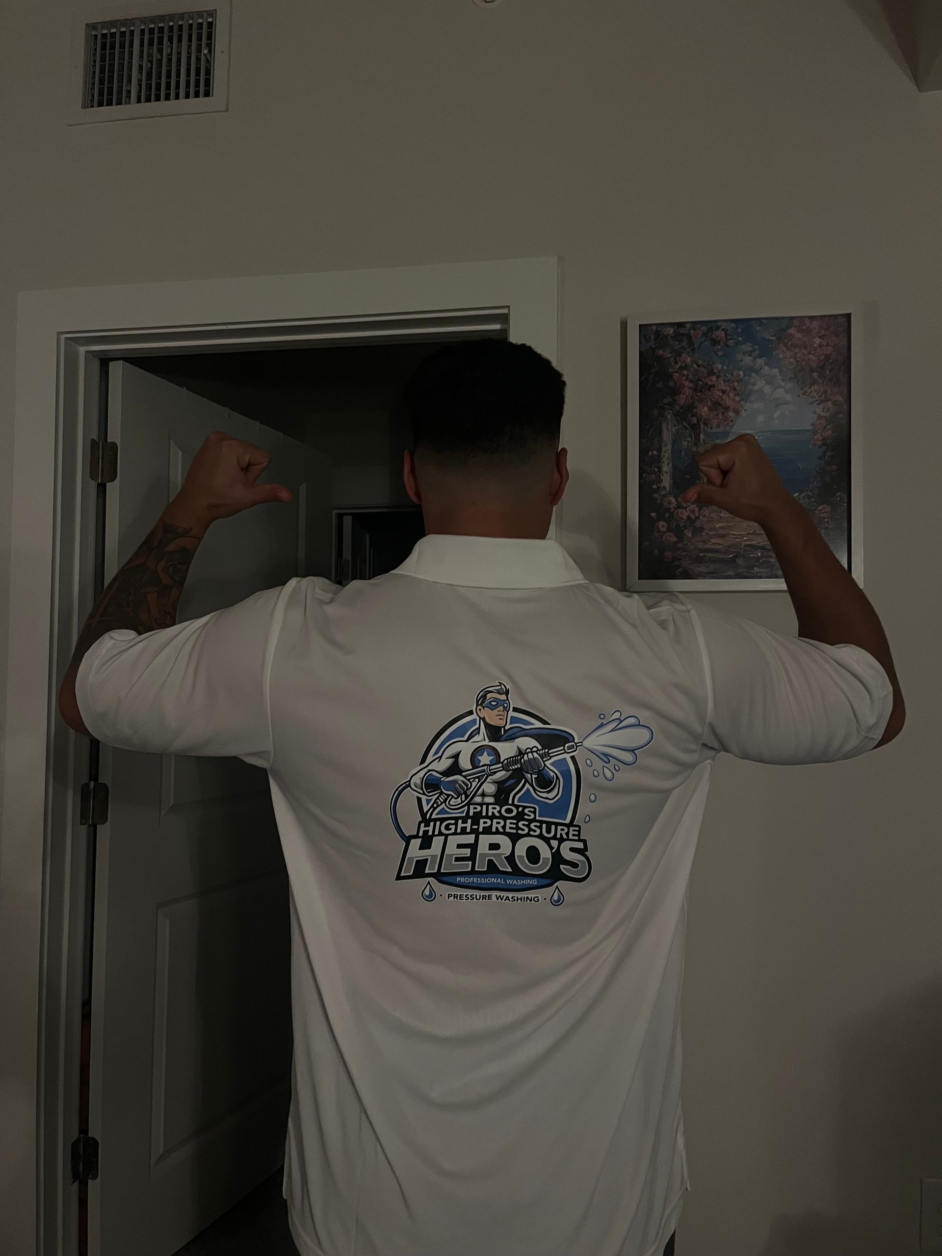 Before and after of a white house exterior being power washed; blue sky, clean finish.