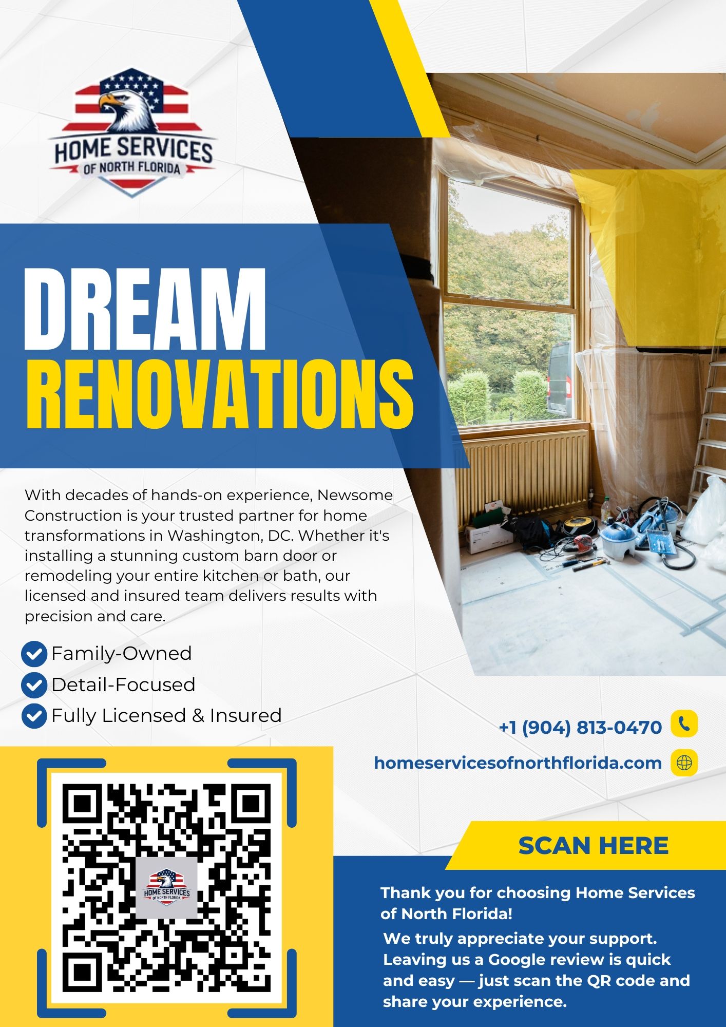 A room with a white wall and a desk in it.