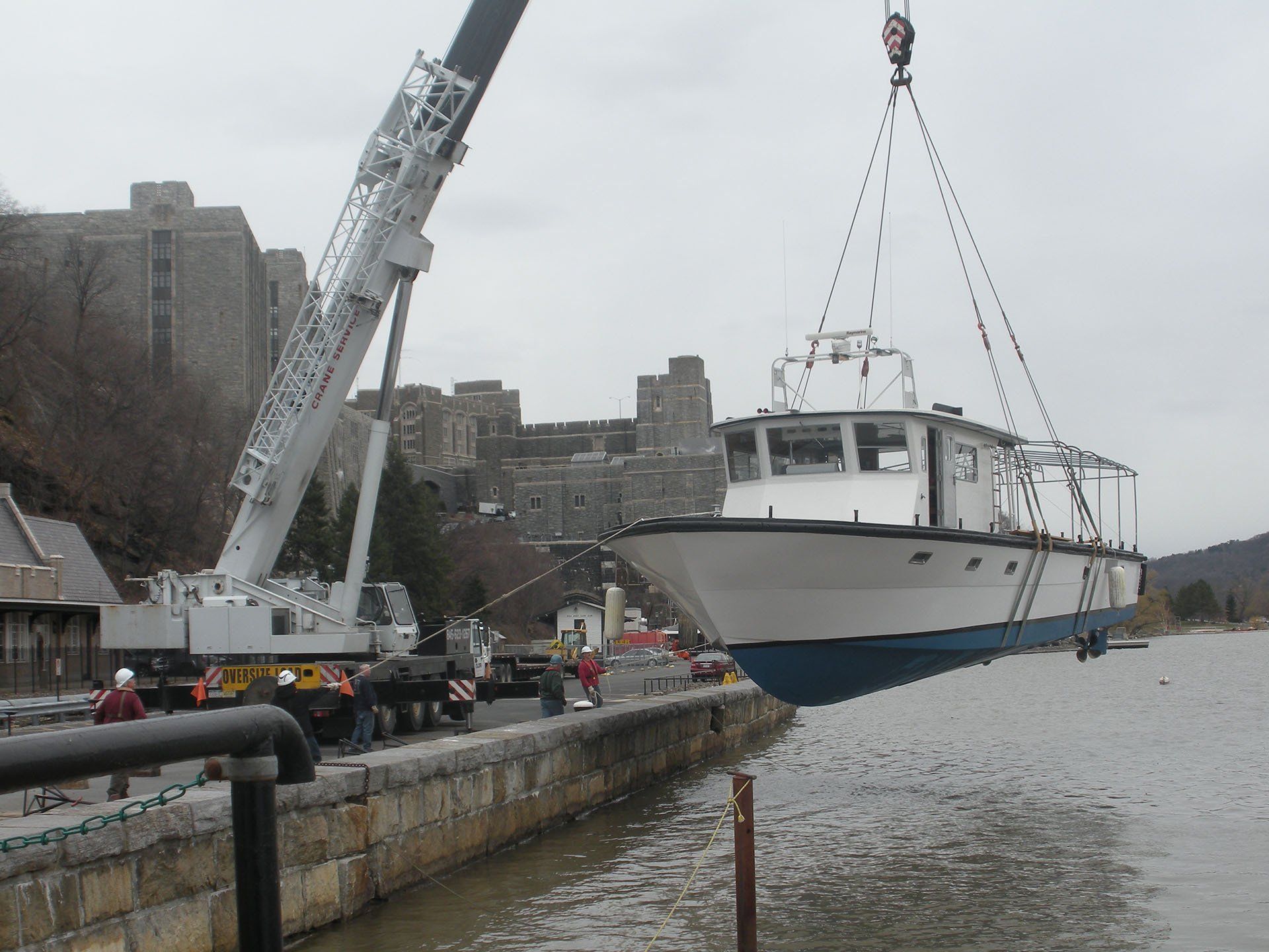 Boat Lifted by a Crane — Nanuet, NY — Olori Crane Service, Inc.