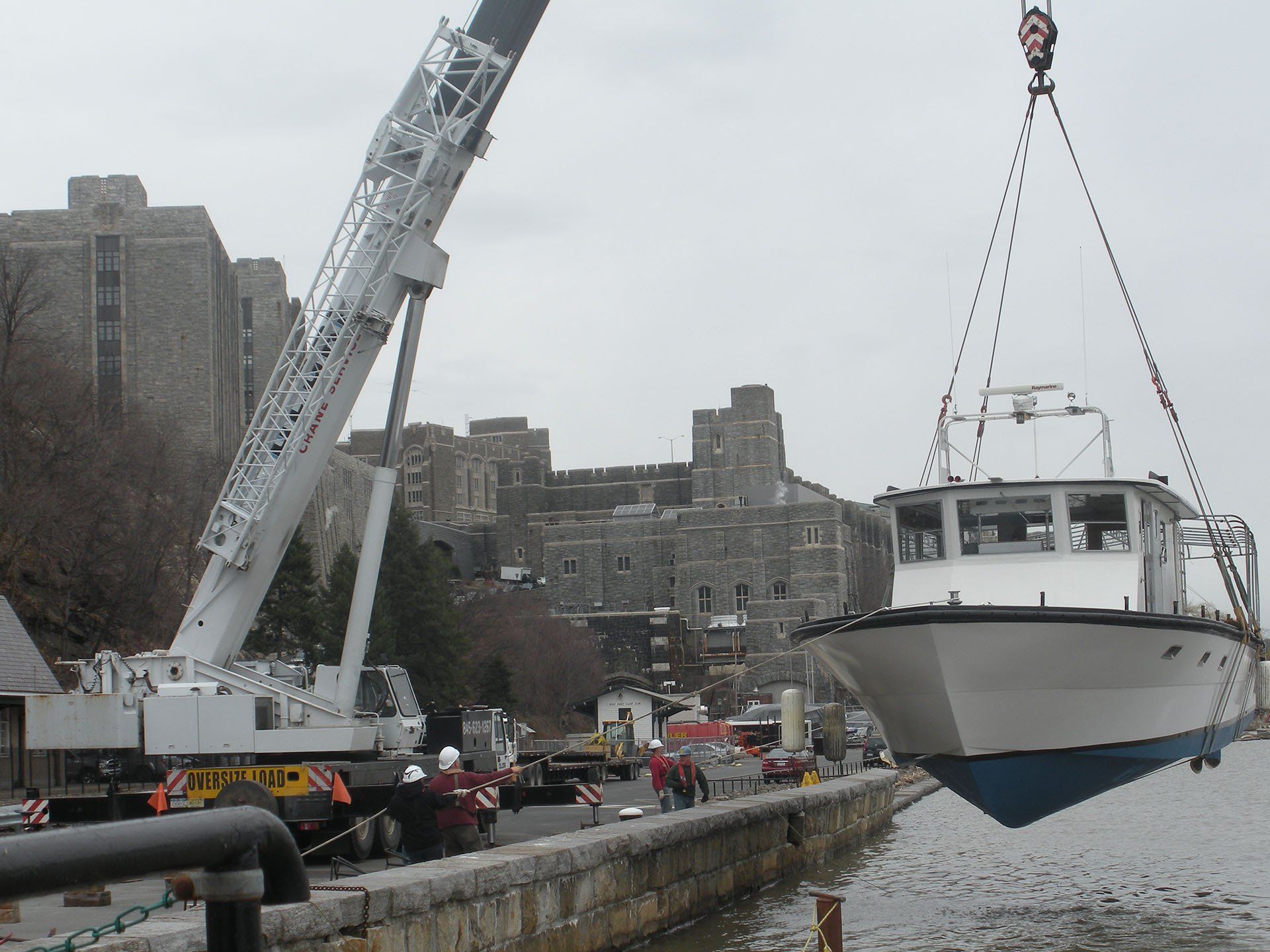Blue and White Boat — Nanuet, NY — Olori Crane Service, Inc.