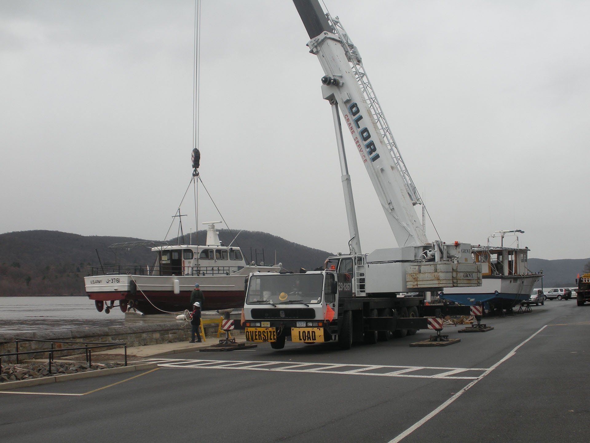 Crane Lifiting a Boat — Nanuet, NY — Olori Crane Service, Inc.