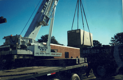 Crane Lifting Large Electrical Box — Nanuet, NY — Olori Crane Service, Inc.