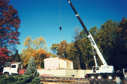 Crane Lifting a Large Box — Nanuet, NY — Olori Crane Service, Inc.