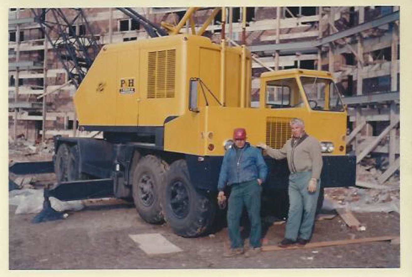 Two Men Behind a Crane — Nanuet, NY — Olori Crane Service, Inc.