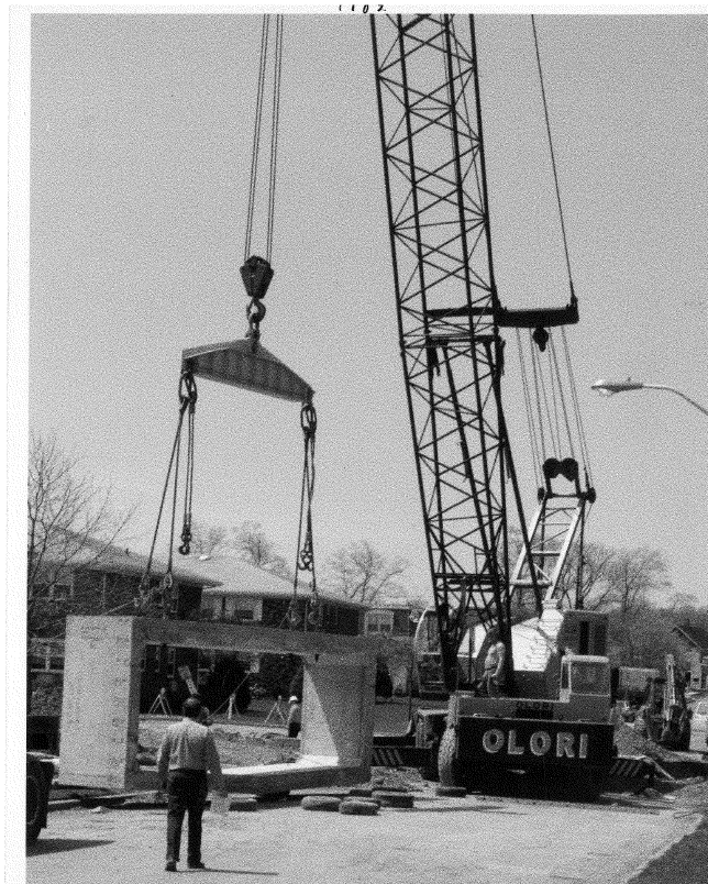 Crane Lifting Concrete Block — Nanuet, NY — Olori Crane Service, Inc.