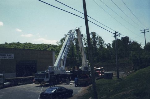 Two Crane Near a Machine Shop — Nanuet, NY — Olori Crane Service, Inc.