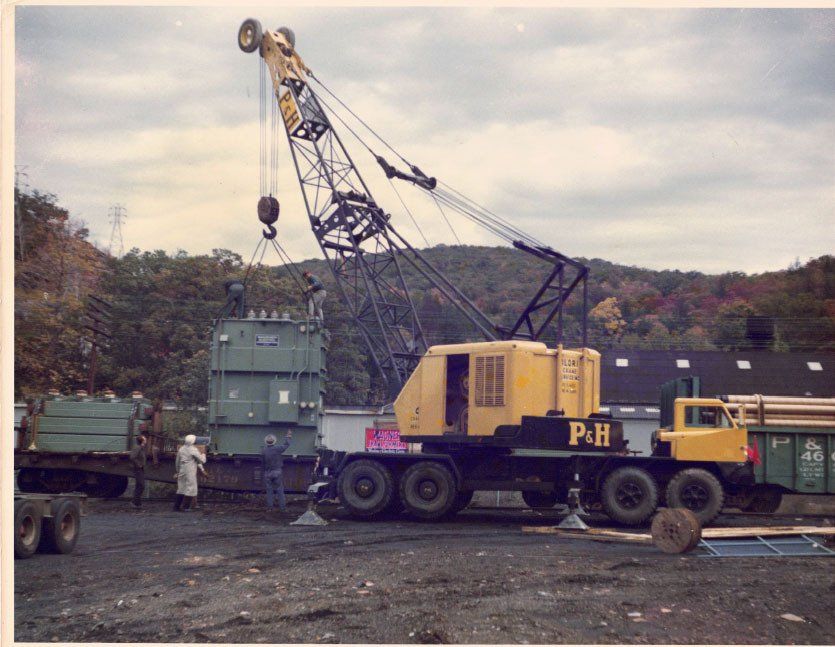 Lifting a Heavy Equipment — Nanuet, NY — Olori Crane Service, Inc.
