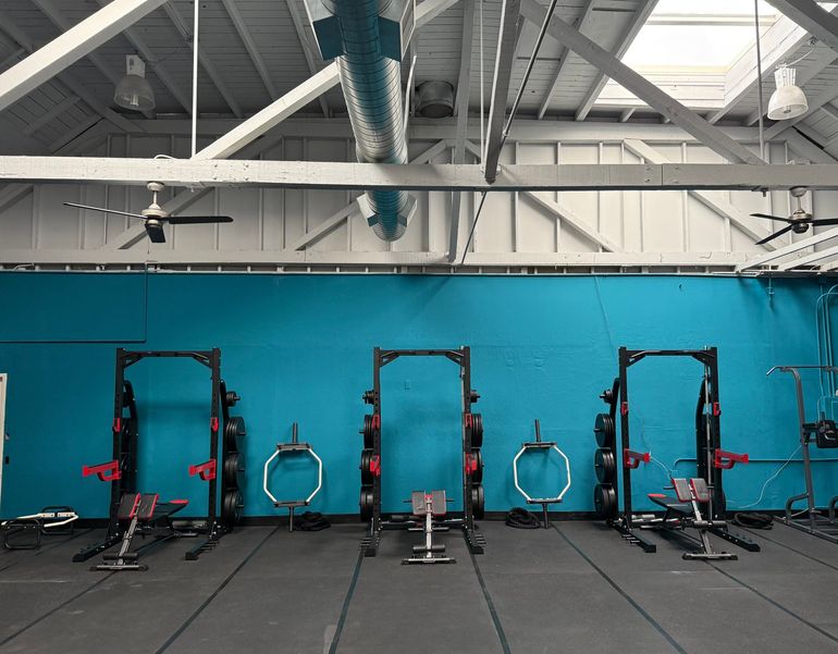 The Unbound studio floor with racks and open training space