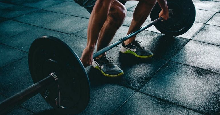 Lifter mid-deadlift in the training area