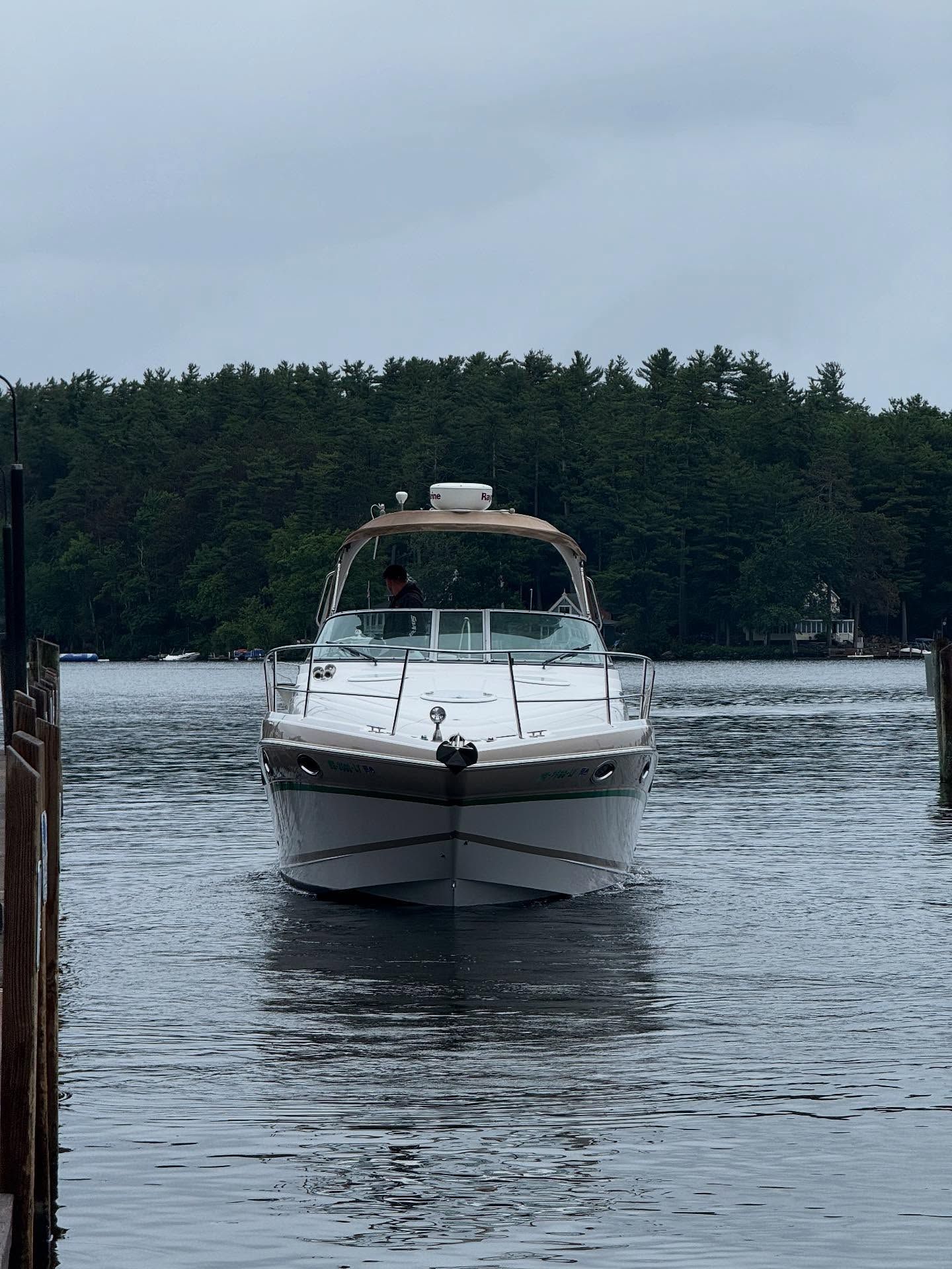 A boat is floating on top of a body of water.