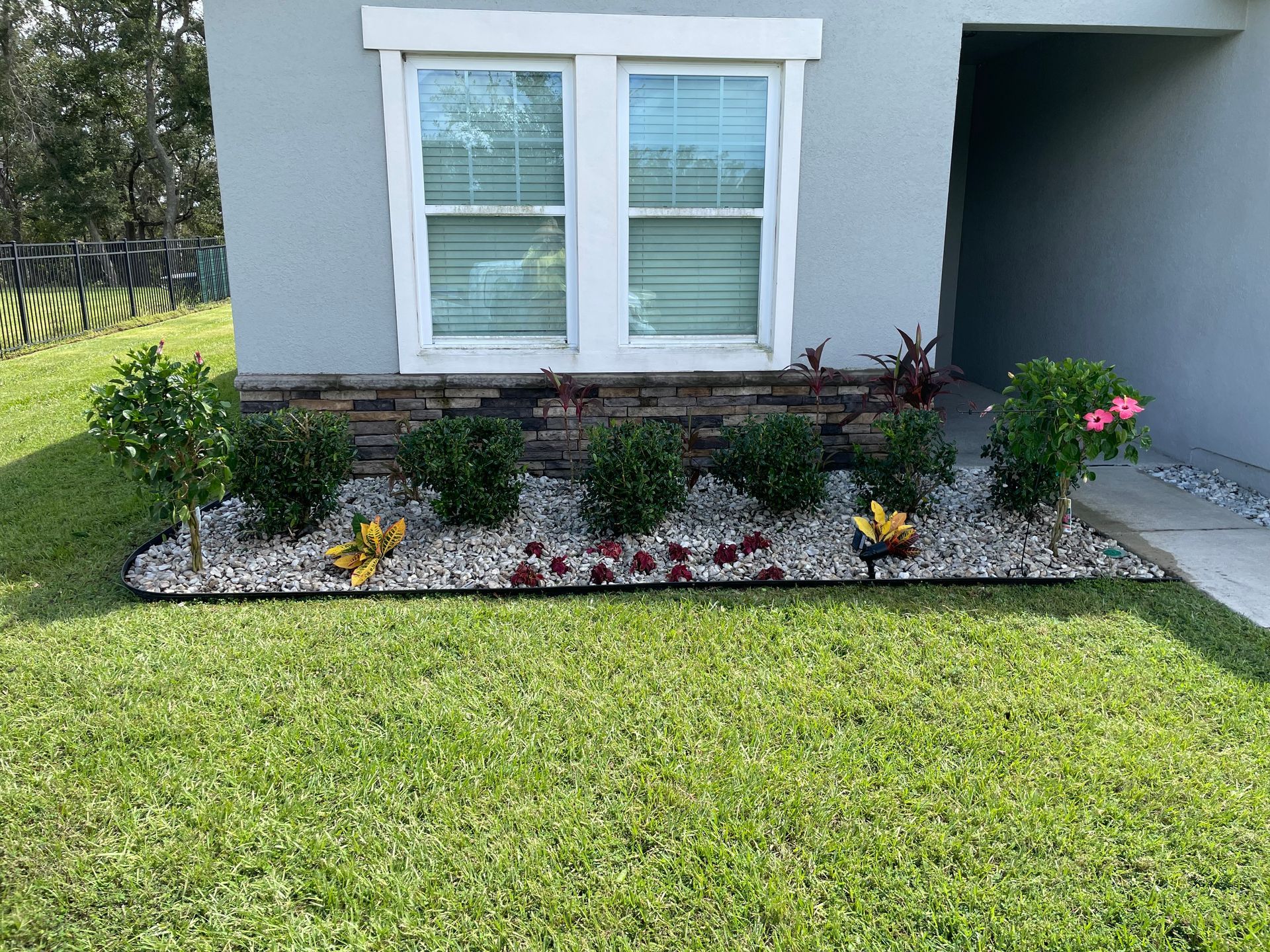 a house with a garden in front of it