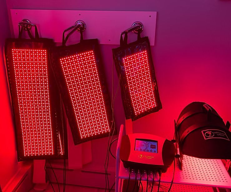 A bunch of red lights are sitting on a table in a room.