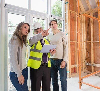Constructor Telling Owners The Renovation Plan — Plumbing Contractor in