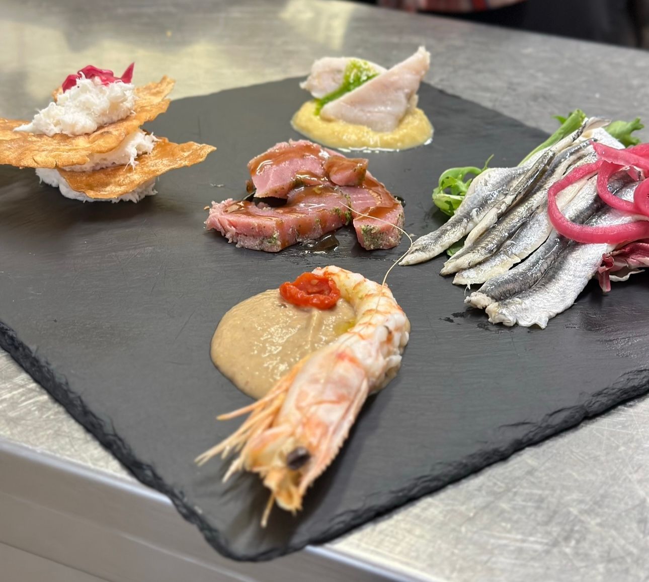 Cena al Ristorante Vela Blu di Riccione: piatti di pesce fresco, porzioni abbondanti e vista mare