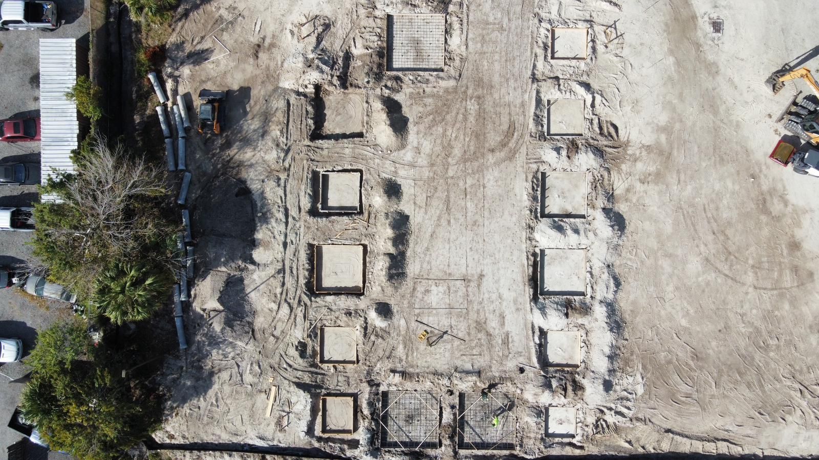 An aerial view of a building under construction.