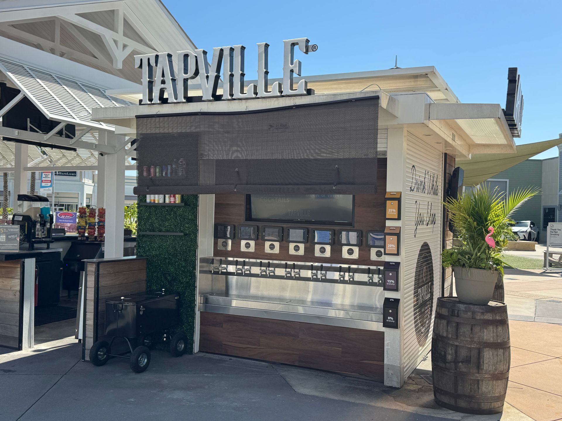A small building with a sign that says tapville on it.