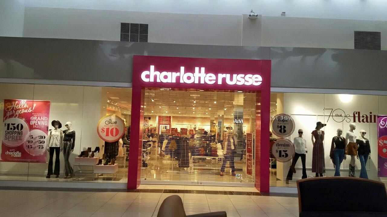 A store called charlotte russe is located in a mall.