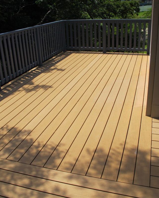 A Wooden Deck With a Fence Surrounding It — B & B Timbers Ballina In West Ballina, NSW