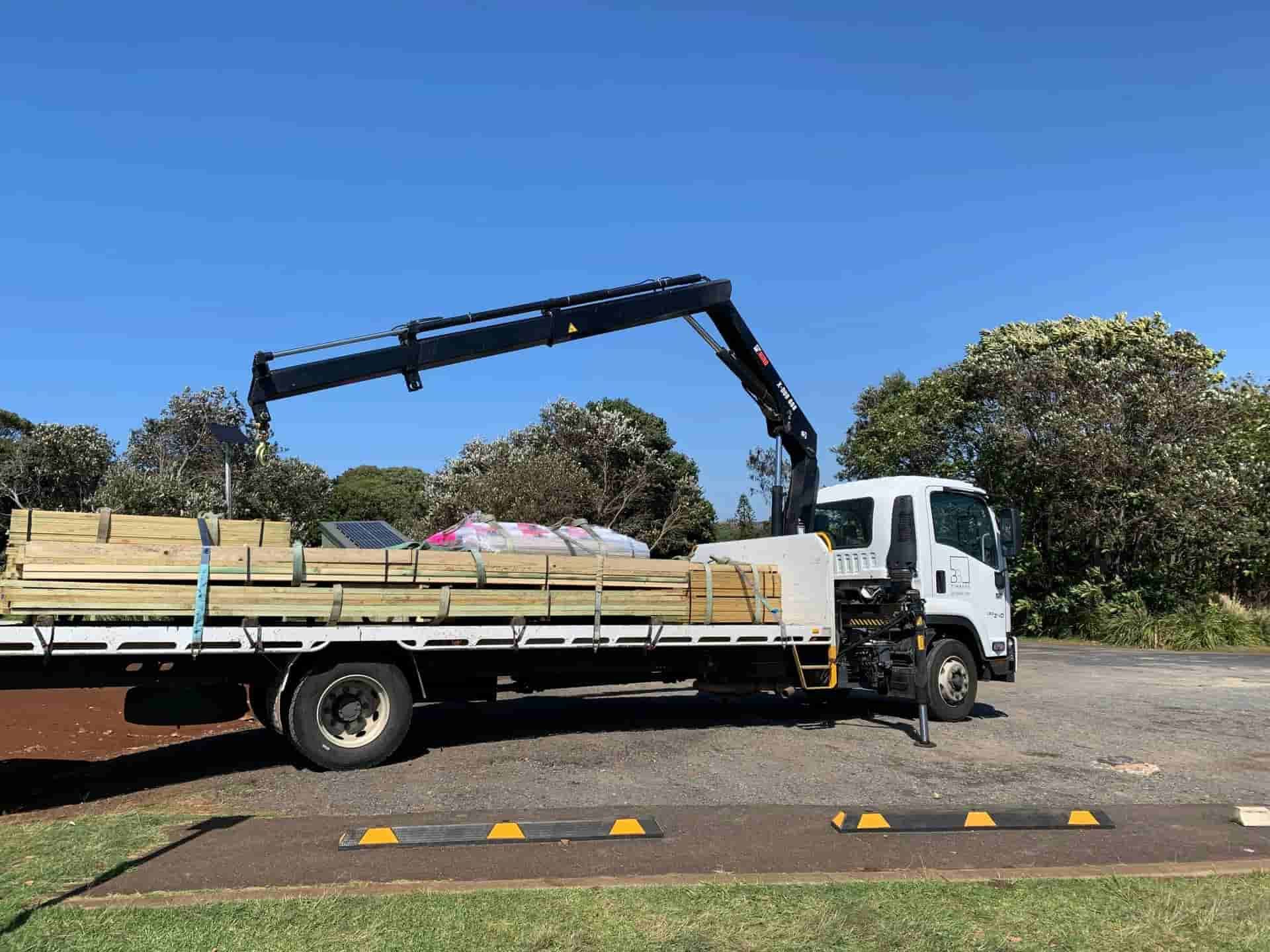 BB Timbers Truck  With a Crane on the Back is Carrying Wood — B & B Timbers Ballina In West Ballina, NSW