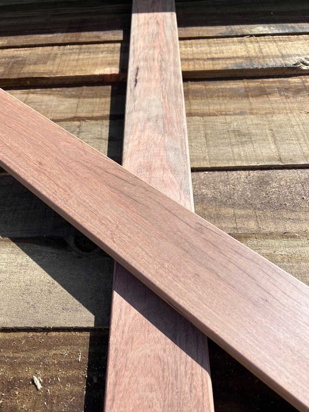 A Piece of Wood is Sitting on Top of a Wooden Table — B & B Timbers Ballina In West Ballina, NSW
