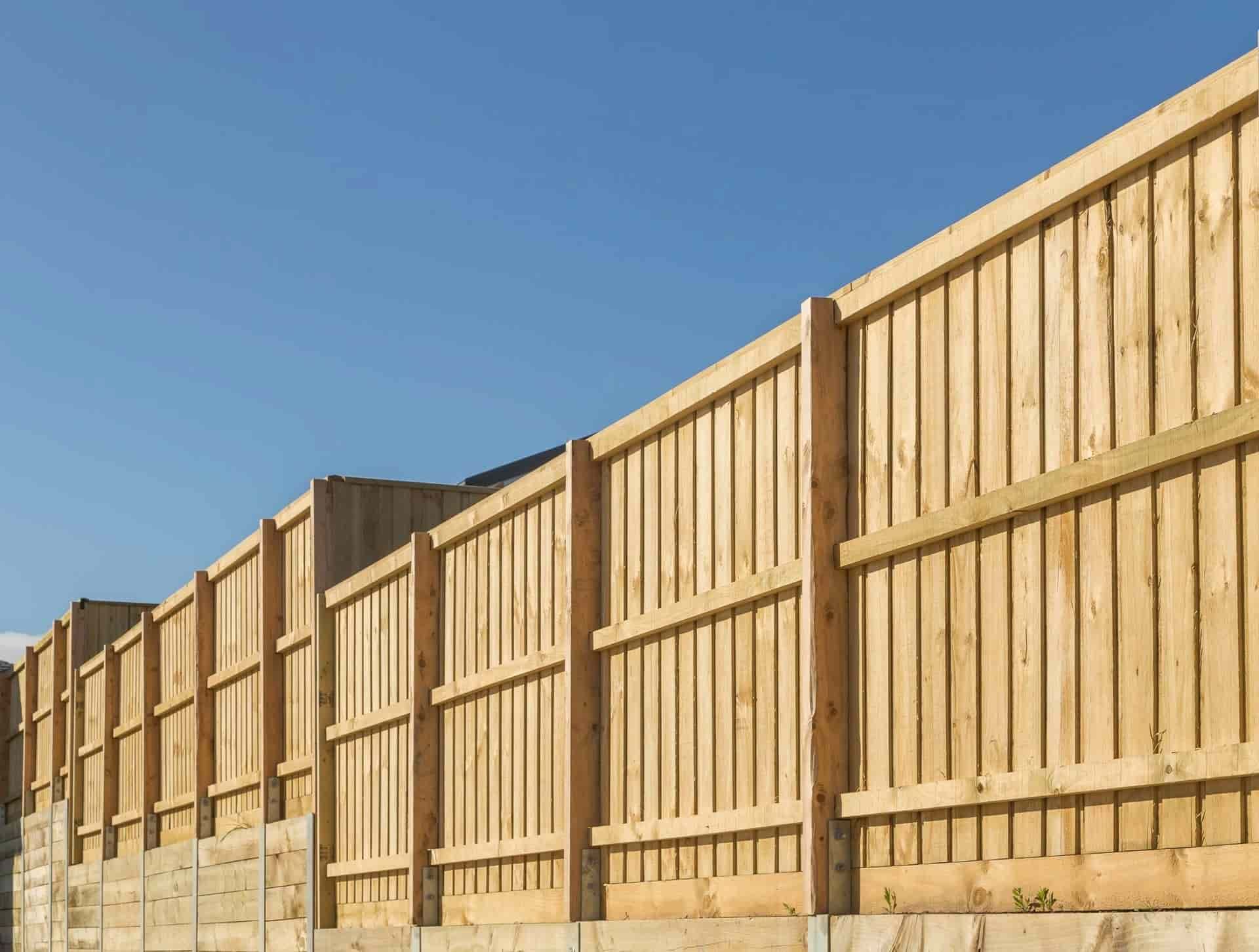 A Row of Wooden Fences Against a Blue Sky — B & B Timbers Ballina In West Ballina, NSW