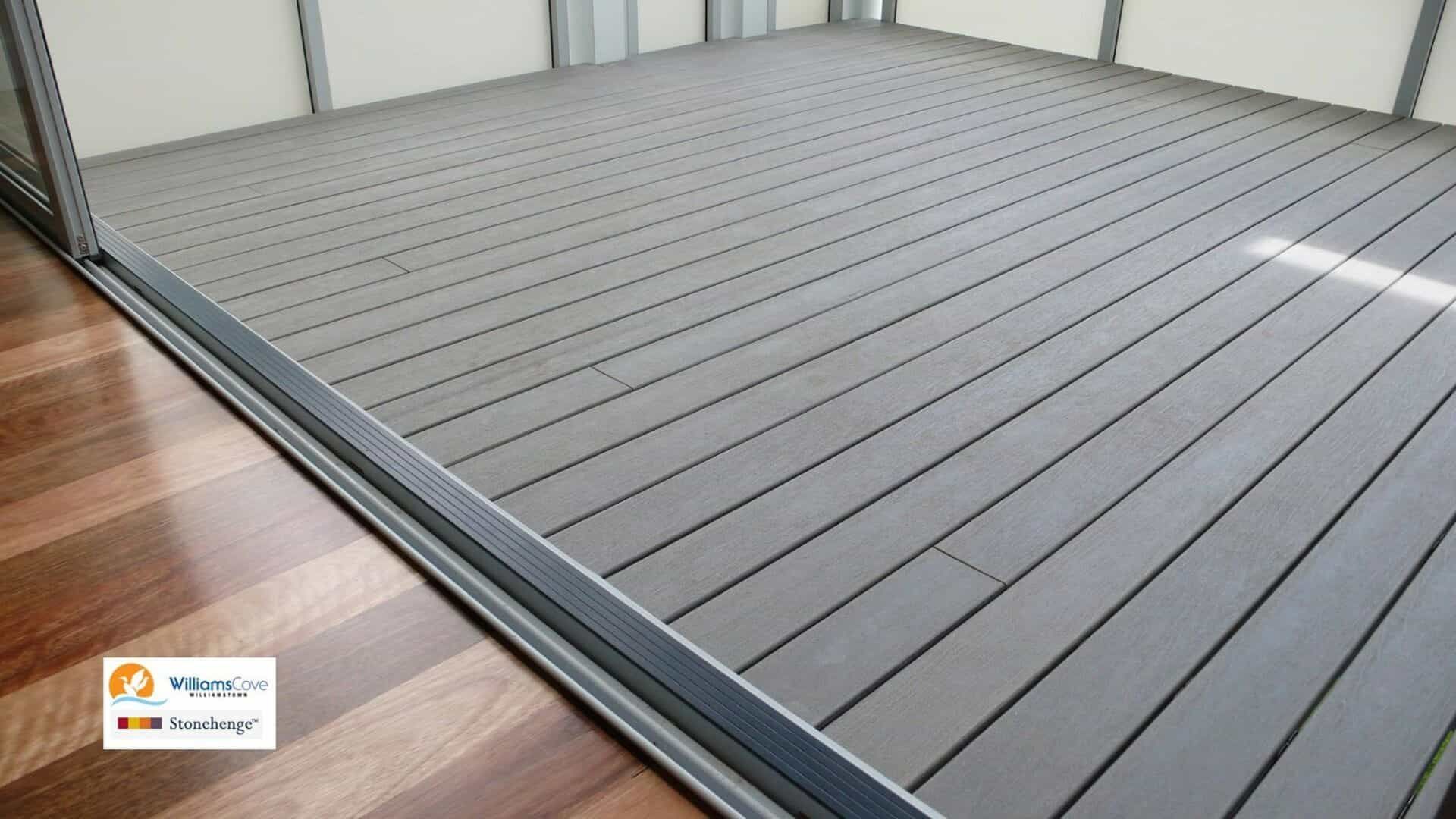 A Wooden Deck With a Sliding Glass Door — B & B Timbers Ballina In West Ballina, NSW