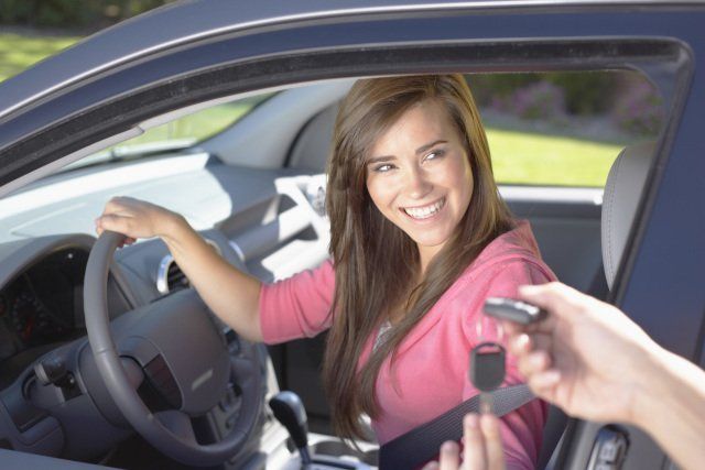 Car Locksmith — Girl Getting Her New Car Keys in Morristown, TN