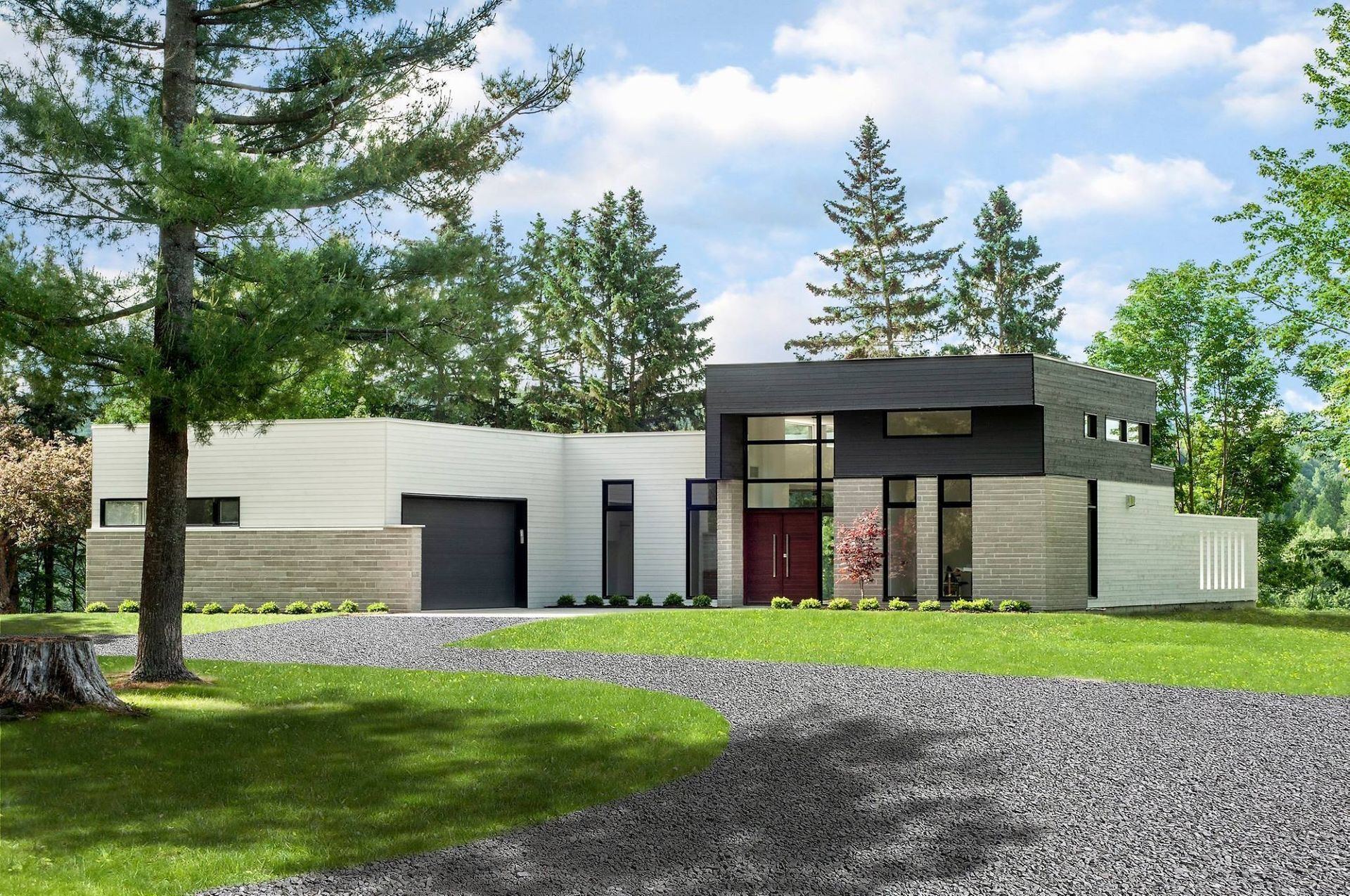 Maison moderne avec garage sombre et étage supérieur noir, allée de gravier, pelouse verte, arbres.