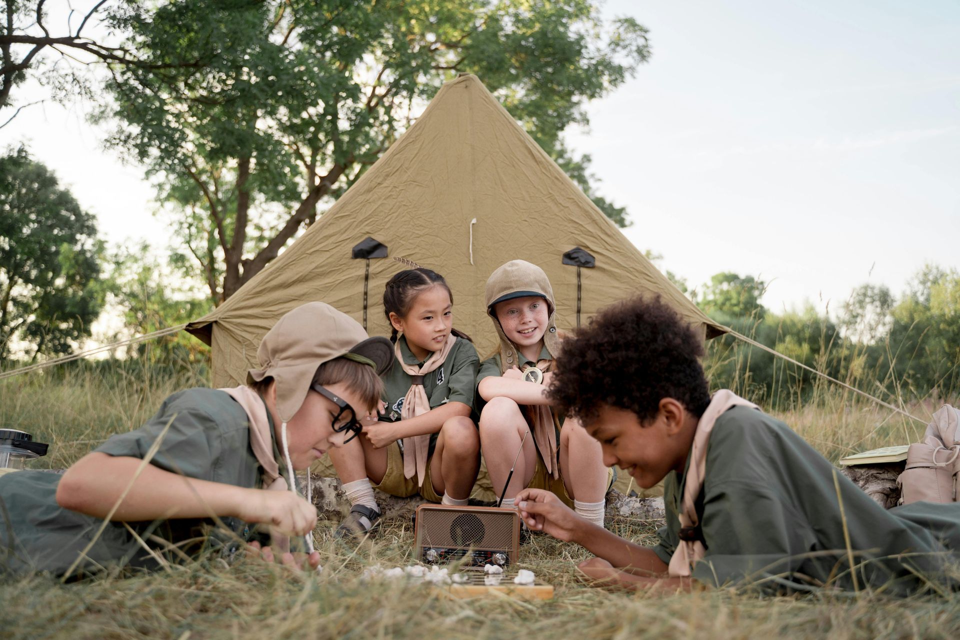 A man is teaching a group of students in a classroom.