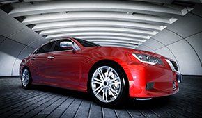 Auto Glass Service ─ Modern Red Metallic Sedan Car in Richmond, CA