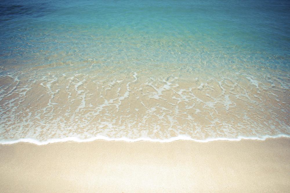 Crystal Clear Water On Ocean Shore — Auto Electrical Service in Ocean Shore, NSW