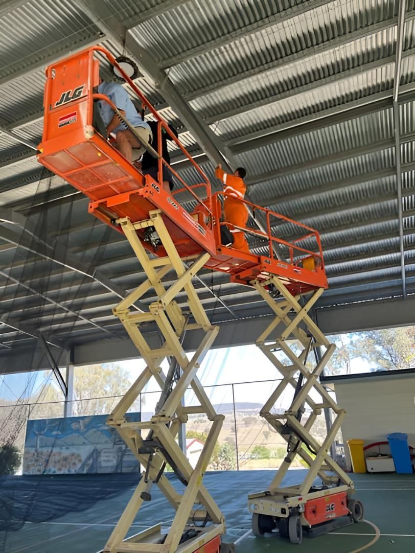 Two Man Doing a Pest Control in a Workplace — Keiran Mortimer Pest Control in Crows Nest, QLD
