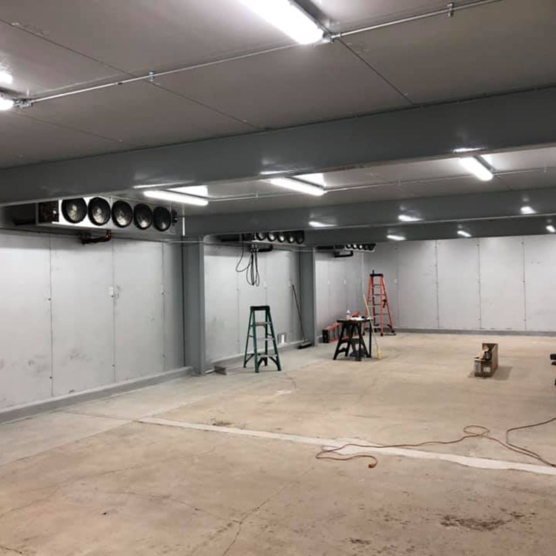 Harrington Electric LLC - There is a ladder in the middle of the room.