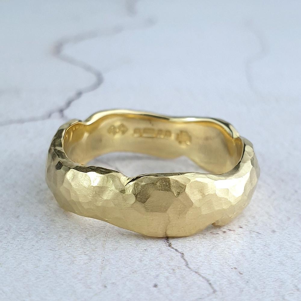 Carved 18ct yellow wedding ring with hammered texture