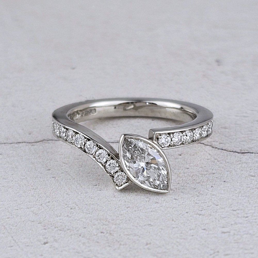 Bespoke diamond dress ring with marquise diamond in platinum